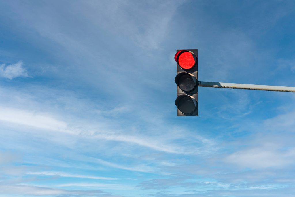 traffic light under blue sky